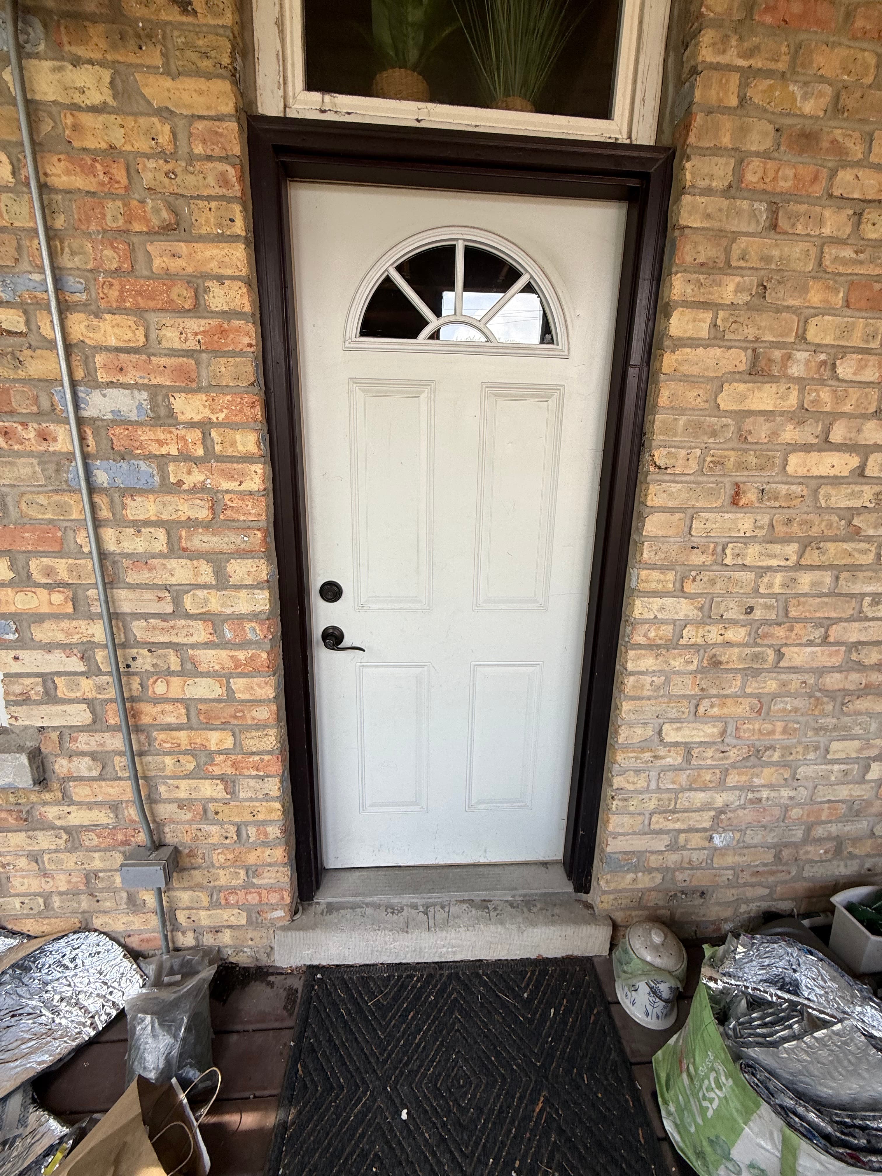 Before photo from door screen replacement in Lincoln Park